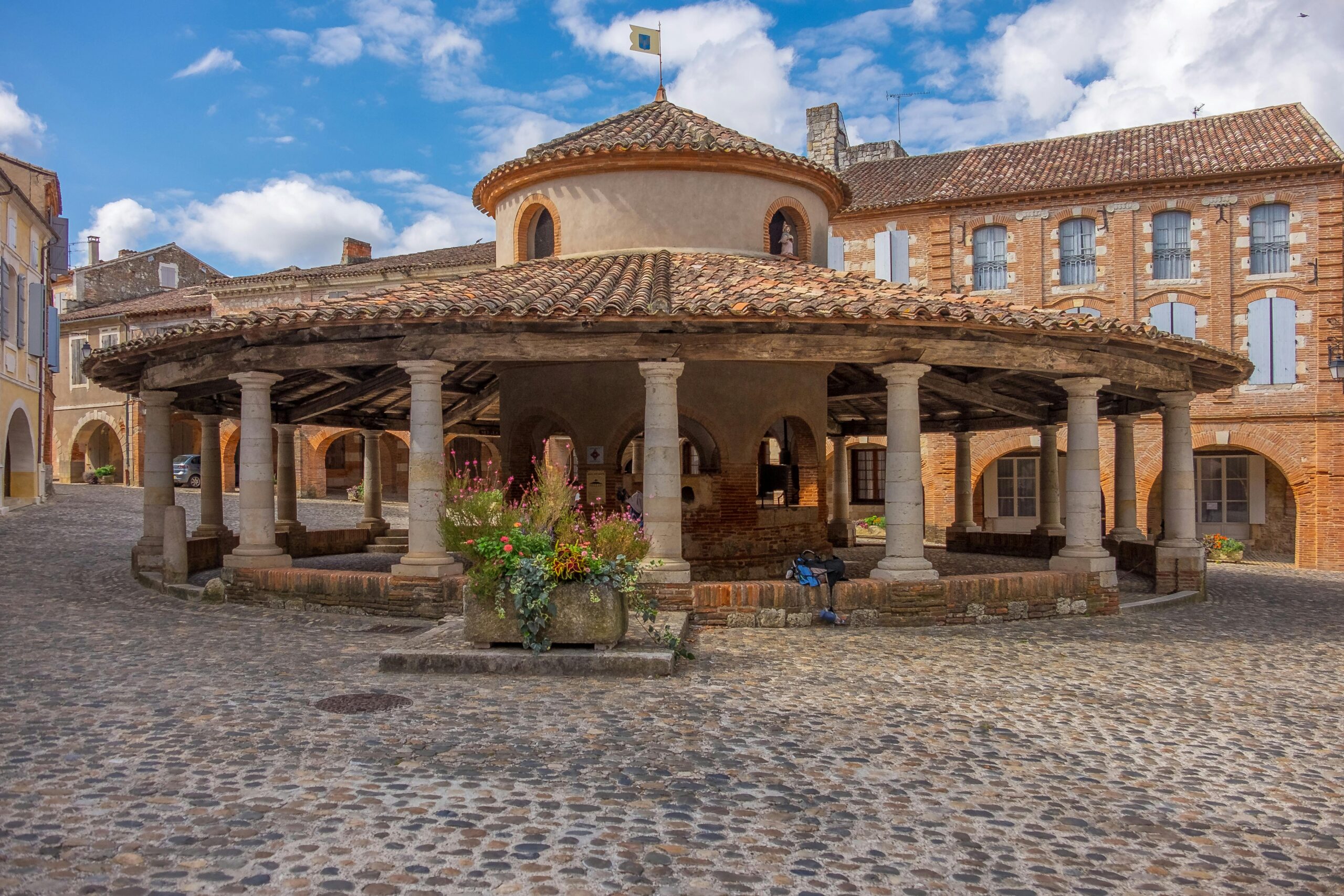 Explore Auvillar's medieval architecture in this historic grain market courtyard in France.